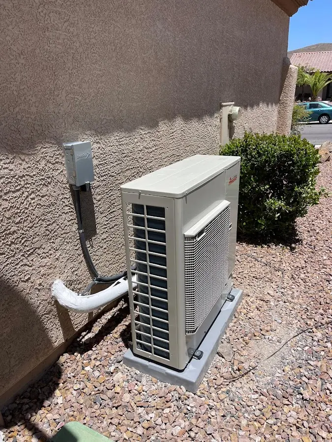 Residential air conditioning condenser unit in Schiller Park